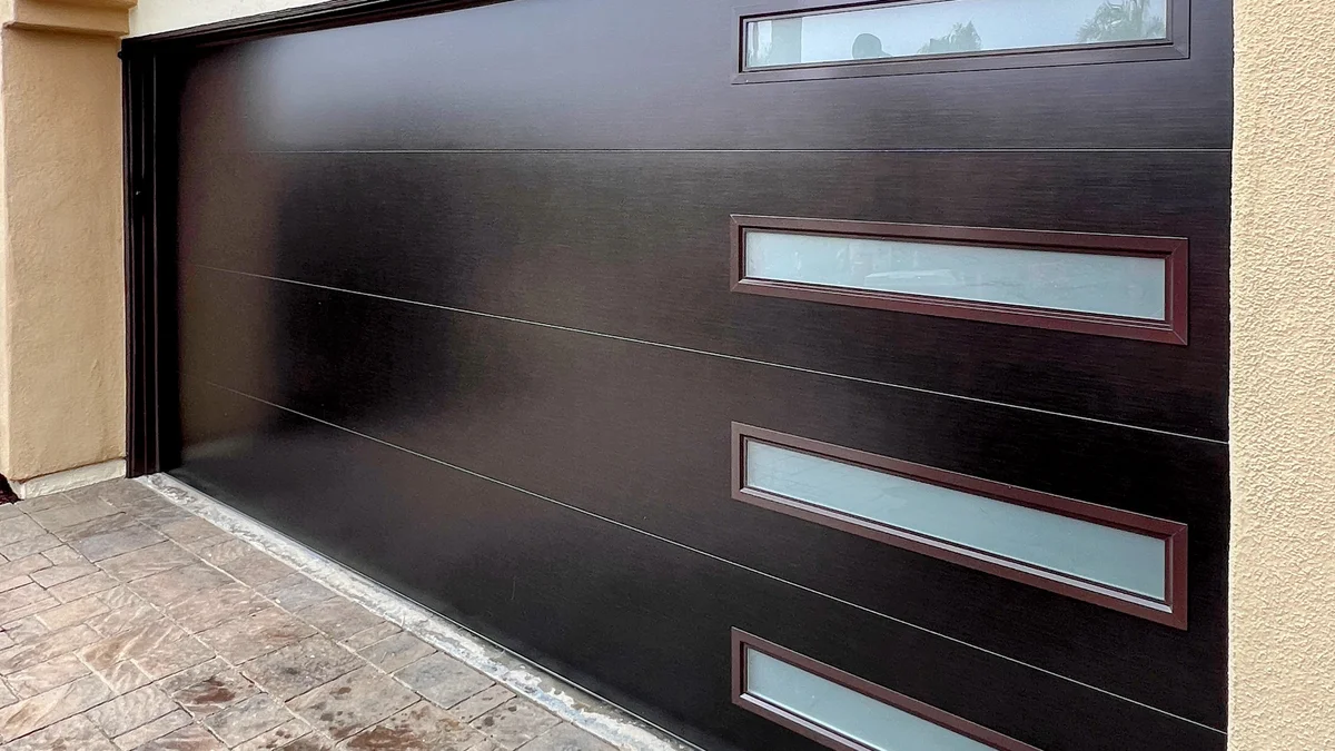 Hormann Modern Tech dark bronze garage door with frosted glass inserts in Dana Point, Orange County CA