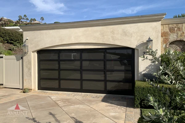 Black Anodized frame full-view glass garage door in Dana Point, CA -- Avaunt Garage Doors