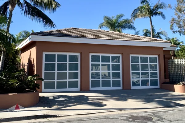 White frame full-view glass garage door in Huntington Beach, CA -- Avaunt Garage Doors