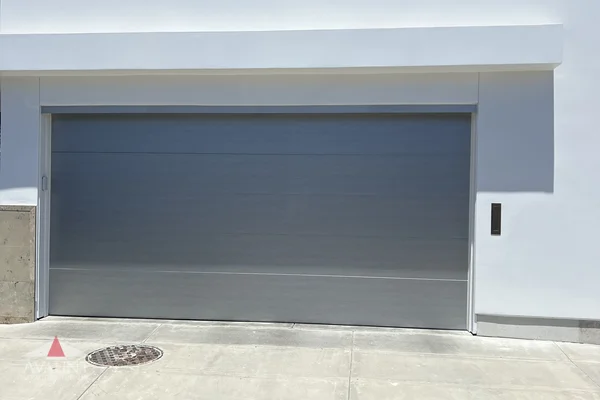 Smooth Steel contemporary garage door in Laguna Beach, CA -- Avaunt Garage Doors