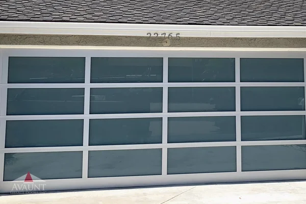 Clear Anodized frame full-view glass garage door in Lake Forest, CA -- Avaunt Garage Doors