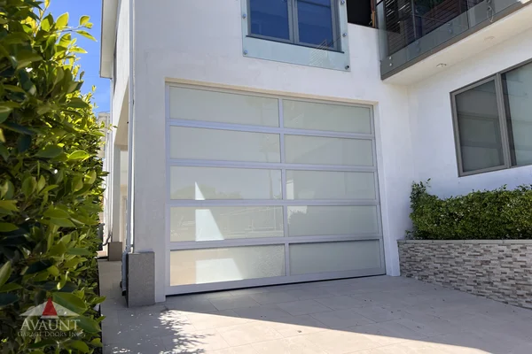 Clear Anodized frame full-view glass garage door in Dana Point, CA -- Avaunt Garage Doors