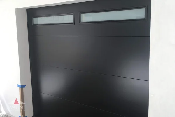 Smooth Steel contemporary garage door in Corona Del Mar, CA -- Avaunt Garage Doors