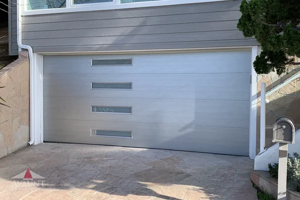 Smooth Steel contemporary garage door in Laguna Beach, CA -- Avaunt Garage Doors