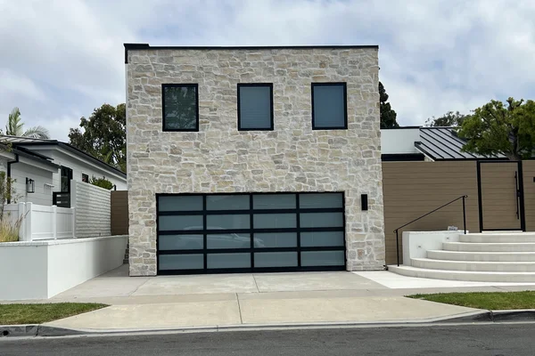 Black Anodized frame full-view glass garage door in Corona Del Mar, CA -- Avaunt Garage Doors