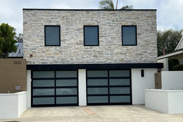Smooth Steel contemporary garage door in Corona Del Mar, CA -- Avaunt Garage Doors